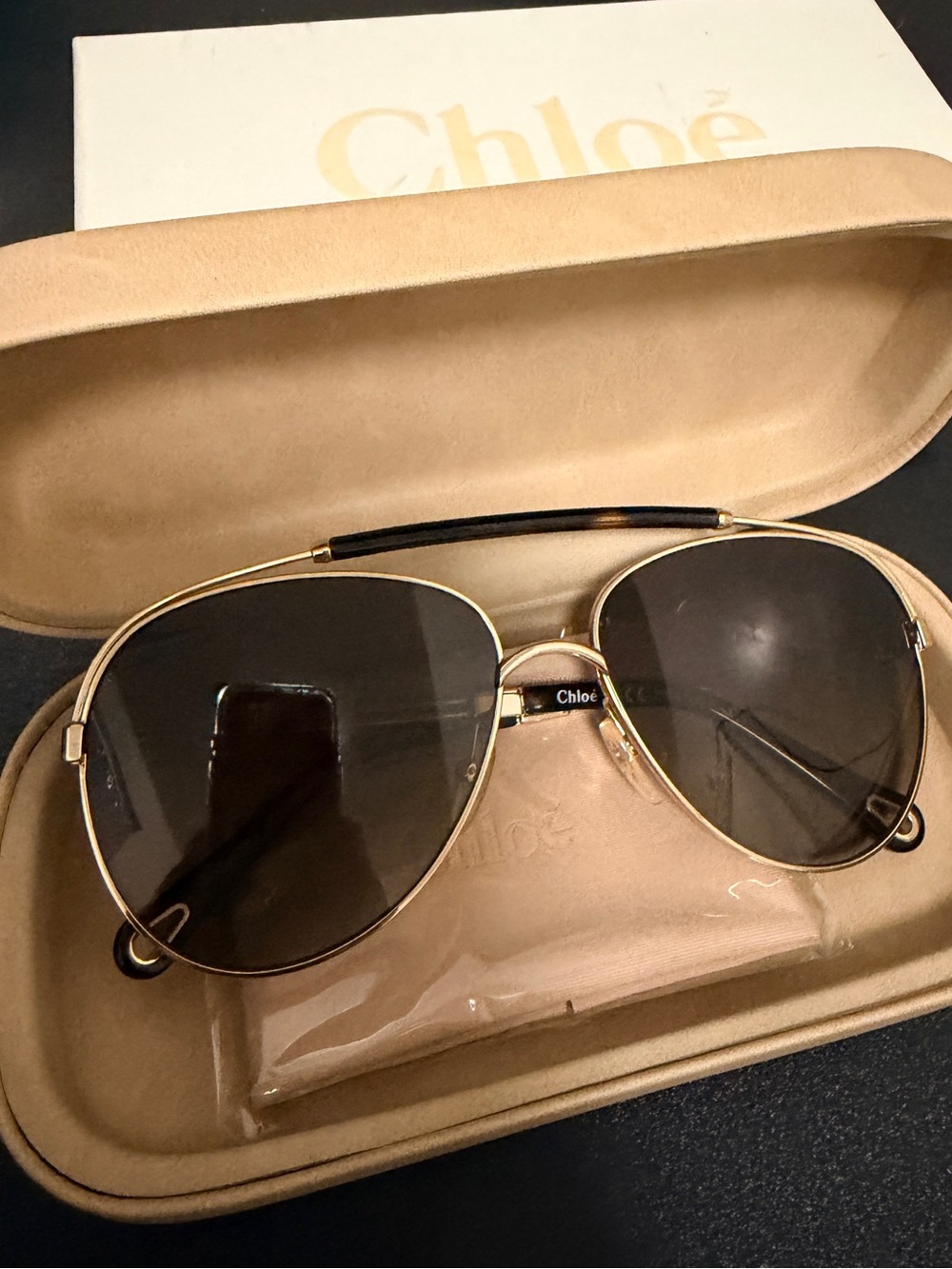 Chloe women’s Aviator Sunglasses in Gold
